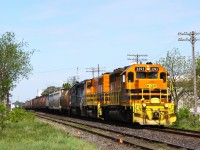 While puttering around for the day my dad and I heard on the scanner GEXR 431 calling GEXR 2211 in Kitchener for a clearance through town. We learned that they were about a half an hour outside of Kitchener and fortunately, so were we. We also heard some track guys in Kitchener who were doing so track welding, I’m guessing for the major upgrades which include welded rail and CTC signals, associated with trying to improve Via/GO service along the Toronto-London corridor (although GO now only goes as far outside of Toronto as Kitchener). To improve the situation we learned that 431 would be setting off in the yard, which made the above location ideal for watching him set off. It was nice to see GEXR 3030 back in service after being in the intensive care unit for a broken crank shaft and also newly renumbered GEXR 3394.   