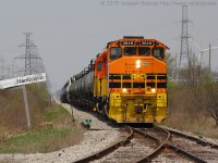 RLHH 3049 is seen leading SOR 595 by the Nanticoke Station sign.  It was a nice treat to get 3049 leading on the Hagersville Subdivision, with RLHH 3404 sidelined with a traction motor failure 3049 has been leading more frequently.  <br> <br> I have shot this angle a couple times in the past years and have seen many changes, mostly in the form of the motive power.  The Nanticoke sign is the thing that has not changed…does anyone have old Nanticoke photos of this angle?  They could make for a possible Time Machine contender on the Railpictures.ca Website.  If you have one, please feel free to share, I know the viewers would love to see it!