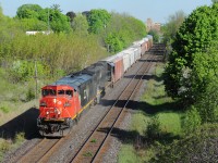 CN 435 throttles up out of Brantford with CN 2452 and IC 1010 providing the power on a lovely May afternoon.  I finished work at 5 and got a timely heads up that 435 was close to being done their yard work from a friend, so a quick drive over to the Brant Ave overpass worked out well.