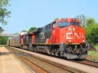 Two AC locos 2881 and 2843 storm up Woodstock bank with a mixed freight on the north track.