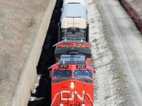 With a whistled greeting, CN 393 glides down the hill to the Paul M. Tellier railway tunnel (better known by its old name, the St. Clair Tunnel) with 115 cars in tow.