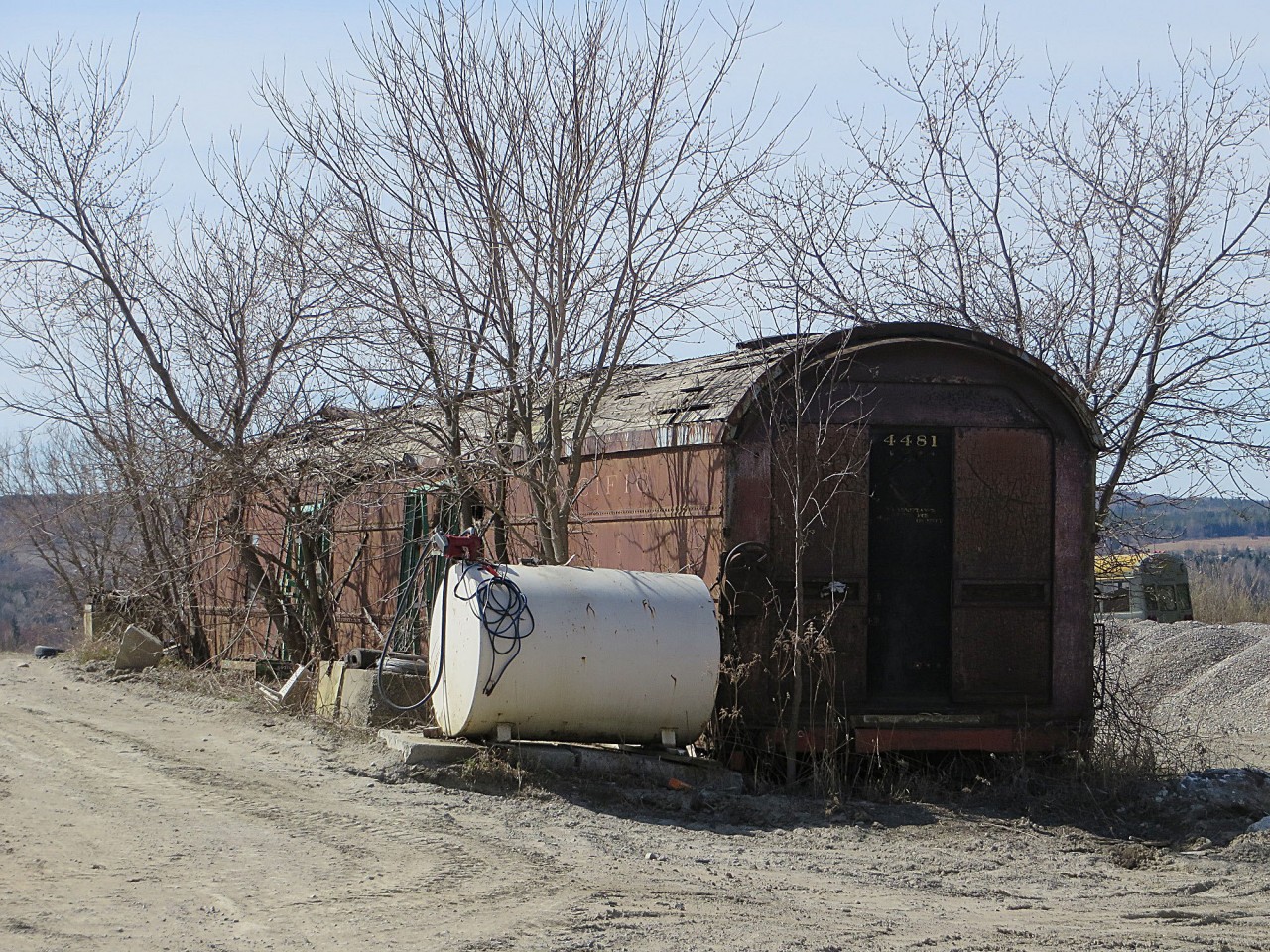 This baggage car moved around a bit before ending up at a gravel pit to the east of Tottenham. It spent some time at Uhthoff as it was being considered as an addition to Webers restaurant. I believe it moved to Medonte when the line to the Quarry was abandoned. It then went to the South Simcoe Railway and finally ended up here.
