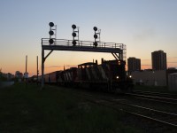 A shot in any light of a GMD1 looks great. Here CN 1412 sits under the searchlight signal bridge west of the yard before sunset
