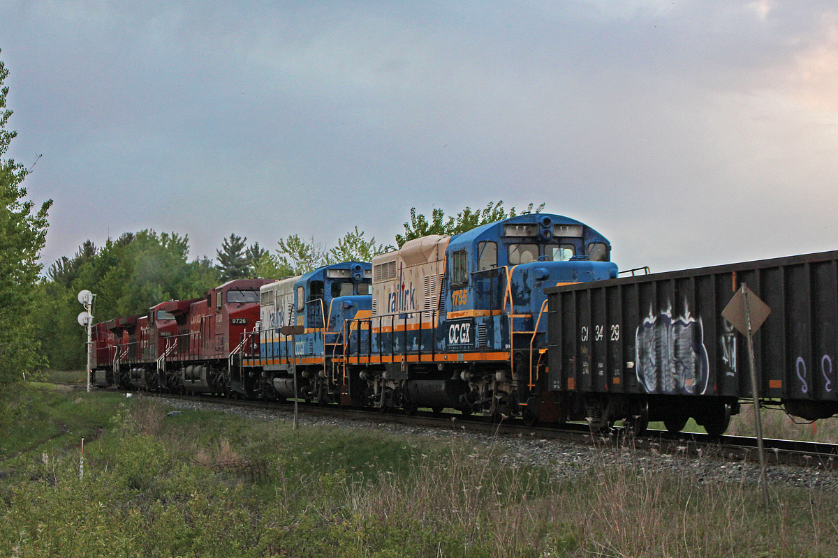 These two ex RaiLink units spent two years at the CP/BCRY interchange yard in Utopia, presumably there to provide spare parts for BCRY 1001, a unit which goes to Barrie twice a week to serve local industries and bring back freight for CP. However, these old soldiers are on the move again, to Winnipeg on CP 421. They will likely join the deadline of CP GP9u's there, awaiting a buyer. If not that, they may be used by the Central Manitoba Railway (which owns both the CEMR and BCRY), also for parts. Their condition is quite poor as evident in the picture though, and their only fate I really see at this point is the torch. 1755's heritage dates back to the Pennsylvania Railroad from 1956 (nee PRR 7058). Meanwhile 1808's heritage dates to the Rock Island in 1960 (nee CRI&P 1334). They have surely seen a lot. It's too bad that road is likely at an end. Their last active service was in Hamilton, Ontario in either late 2012 or early 2013 for the Southern Ontario Railway.