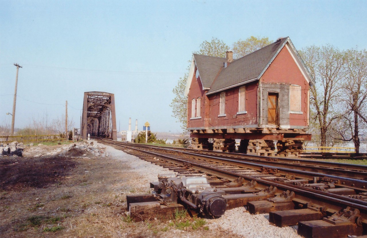 For those of you who might wonder about the little yellow brick station at the Fort Erie Museum at 400 Central Av in that town; well, it used to be known as B-1 Station. It sat at the north side entrance to the International Bridge in what was the town of Bridgeburg before it merged with Fort Erie back in the 1930s. Bridgeburg Station was built by the Grand Trunk in 1873. It was moved to its' present location this week 33 years ago as I post this. In the left of the photo you can see the remains of the stone foundation; the building is now on the south side awaiting wheels and a truck to take it a mile or so down the road. I wish I had seen how they moved it across the tracks!!! Anyone know how this is done? This late afternoon view is certainly wide open compared to how it looks today..........