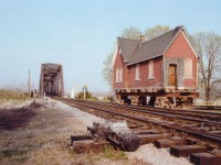For those of you who might wonder about the little yellow brick station at the Fort Erie Museum at 400 Central Av in that town; well, it used to be known as B-1 Station. It sat at the north side entrance to the International Bridge in what was the town of Bridgeburg before it merged with Fort Erie back in the 1930s. Bridgeburg Station was built by the Grand Trunk in 1873. It was moved to its' present location this week 33 years ago as I post this. In the left of the photo you can see the remains of the stone foundation; the building is now on the south side awaiting wheels and a truck to take it a mile or so down the road. I wish I had seen how they moved it across the tracks!!! Anyone know how this is done? This late afternoon view is certainly wide open compared to how it looks today..........