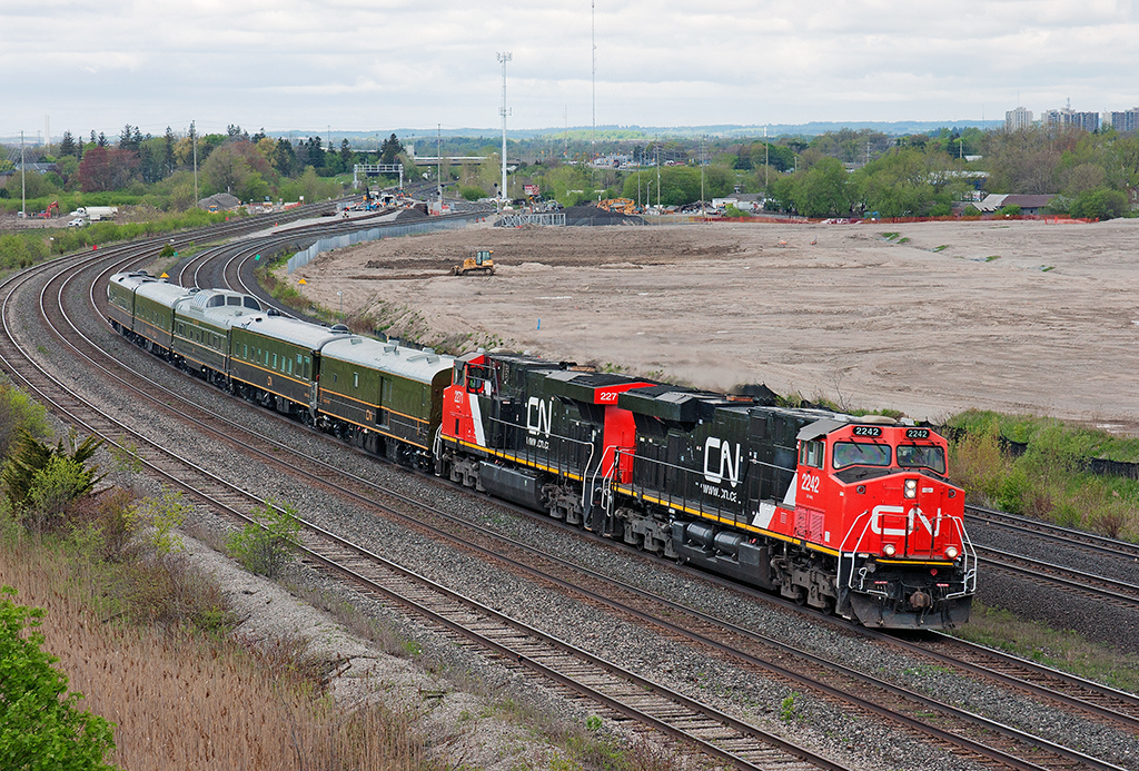 An eastbound company business train chock full of company officials including CEO Claude Mongeau heads east to Montreal behind a pair of recently washed ES44DC's.