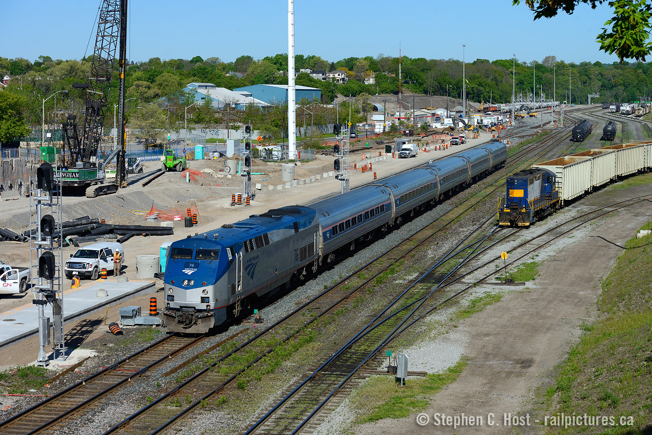 More Ch-Ch-Ch-Ch-Changes. A few new signals have sprouted at James St North - and crews are still busy building the parking garage/station and  platform. Apparently they want to squeeze some GO service in here in a months time... after all all you need is a platform and a staircase.. right?? I say no way it'll make it in time - but then again, stranger things have happened with GO expansion..
The signal at far left - protects the main track - wouldn't Rule 27 apply requiring a 564 (Authority to pass - most restrictive signal would be red!). Normally you'd expect the signal to be turned unless commissioning was imminent..