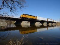 GEXR Train 582 is crossing the Speed River at Hespeler Ontario on a railway built in 1854 to reach Guelph from Galt. No expenses were spared on this portion of the railway - a substantial structure compared to rickety wooden bridges you typically see on Branches. I'm standing basically on the Grand River Railway right of way which ended at Hespeler and crossed the CN at grade just beyond the bridge at my left. 582, heading timetable South - has 8 cars in tow for Hunts Haulage, located at Eagle St in Cambridge and receives two switches per day from 582, along with the other customers in the area keeping the boys busy..