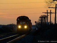 At dusk, T69 is racing east after working Ayr, next stop, Galt, and more work at Guelph Junction. Seems in the hurry to get out the crew forgot to turn on the headlight. Rumour is these signals will be replaced in the near future, searchlights on borrowed time, whom have seen everything from Steam to these third generation engines.