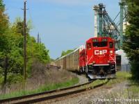 Two trains - This is train 247 - and also Train TH31. Pictured here, the Kinnear yard power is shoving (pushing) 247 up the Hamilton Subdivision mountain grade territory. The grade ends just beyond the power and this is where they normally cut off, on the fly.
<br><br>
As far as I can tell - any train over 2800 tonnes is likely to get pushers on the Hamilton sub (TrAM - Train Area Marshalling - this rule is likely specific to this grade) which means just about all Northbounds, except empty Ethanols and short trains get the pusher treatment.
<br><br>
Head end power was CP 8850 and CP 8564


