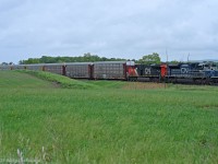 I simply cannot let that Host character outdo me, here's CN 8103 leading 422 at Ash, a little south of Milton. CN 2868 trails, making it a two builder, all-AC traction consist; not the easiest thing to catch on CN. Eastside showing the westside fools how it's done :P 1337hrs.