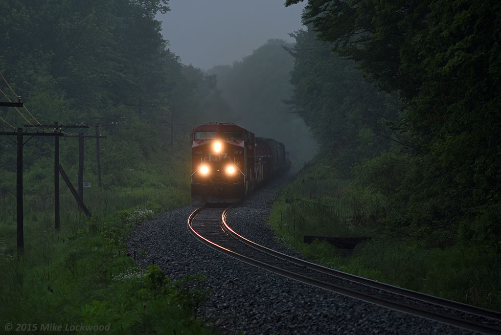 Having met southbound 550 at Bolton, CP 9819 and 8728 hustle 247's train north through the deepening gloom on the approach to Palgrave siding. Next stop, Spence for at set out. 1710hrs.
