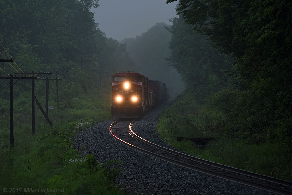 Having met southbound 550 at Bolton, CP 9819 and 8728 hustle 247's train north through the deepening gloom on the approach to Palgrave siding. Next stop, Spence for at set out. 1710hrs.