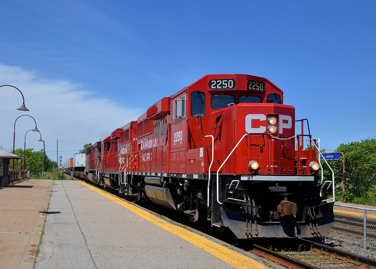 A very late CP 132 has CP 2250, CP 2276 & CP 9609 for power as he passes through the AMT Dorval station at about 1130.