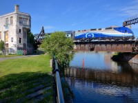AMT 1359 leads AMT 814 past Wellington tower and over the Lachine canal.