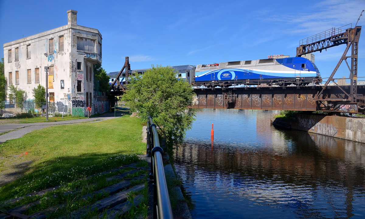 AMT 1359 leads AMT 814 past Wellington tower and over the Lachine canal.