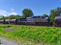 CN 377 with 188 cars total is passing through Dorion with ex-EMD demo CN 8101 as DPU.
