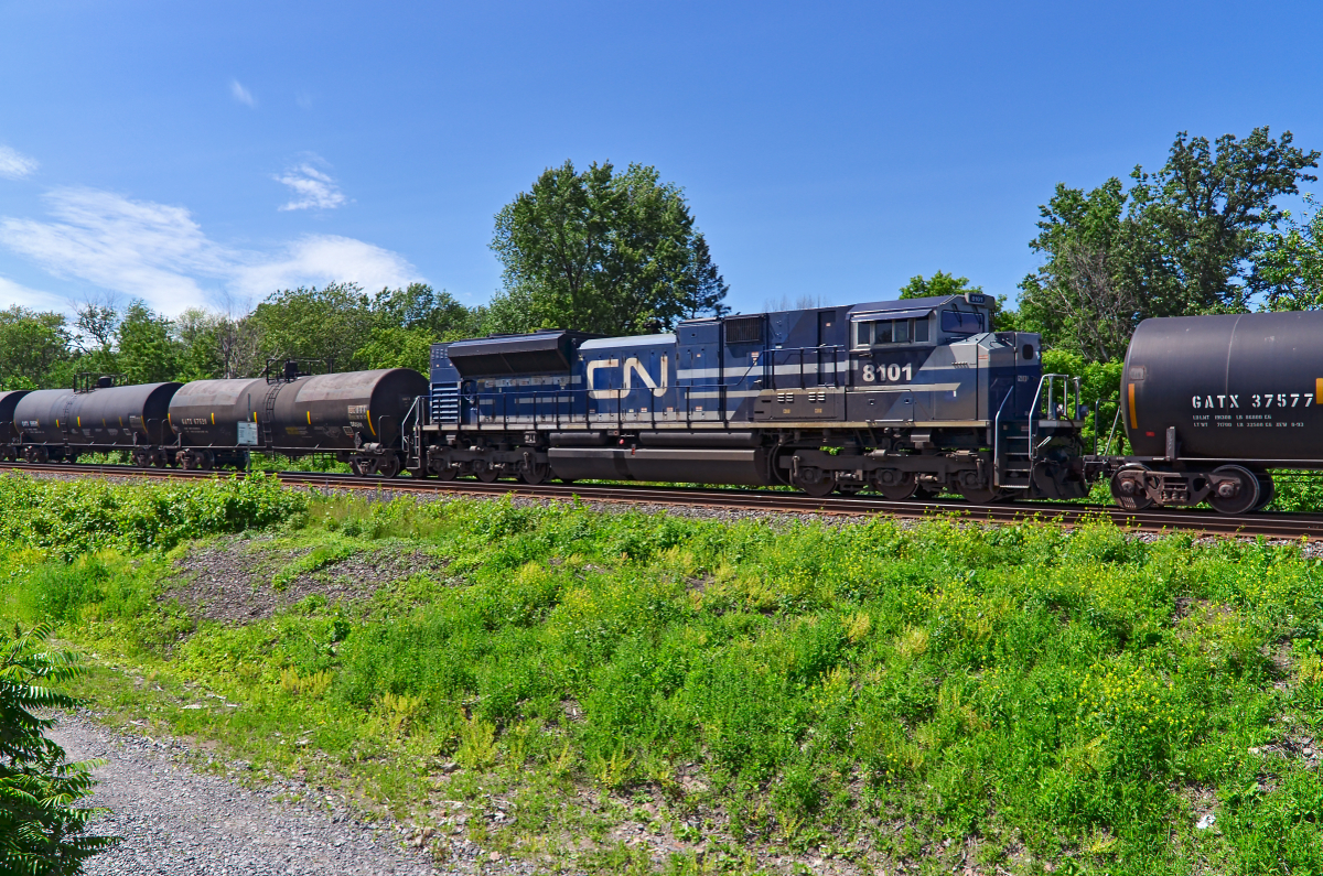 CN 377 with 188 cars total is passing through Dorion with ex-EMD demo CN 8101 as DPU.