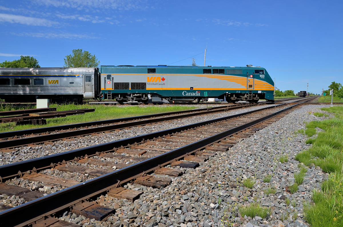 Crossing the Winchester sub. VIA 52 is southbound on VIA Rail's Alexandria sub as he crosses CP's double track Winchester sub at De Beaujeu just a few minutes after CP 550 passed eastbound.