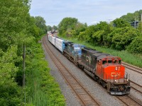 CN X324 has a great lashup composed of CN 5266 and IC 2460 as he heads towards St. Albans and interchange with the NECR.