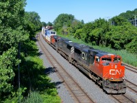 CN 120 is eastbound on the Montreal sub with a pair of SD70M-2's sandwiching a BCOL Dash9 (CN 8814, BCOL 4649 & CN 8924).