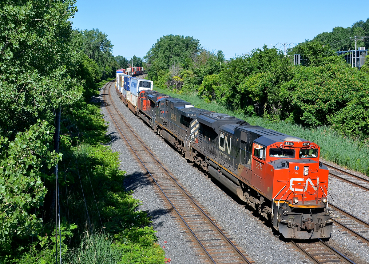 CN 120 is eastbound on the Montreal sub with a pair of SD70M-2's sandwiching a BCOL Dash9 (CN 8814, BCOL 4649 & CN 8924).