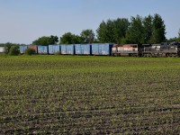 An eclectic lashup composed of NS 9926 & BCOL 4610 leads CN 394 on the SL&A Sherbrooke Sub on their way to Richmond.