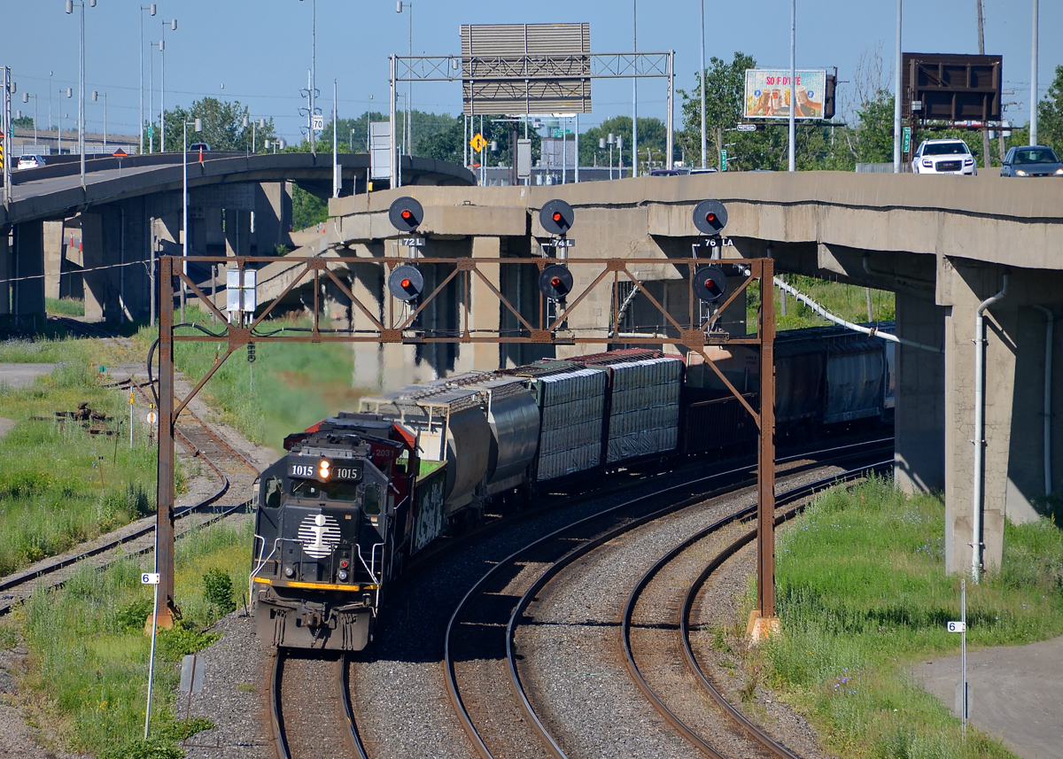 A death star leader through Turcot West. A later than usual CN 310 has an IC SD70 leading (IC 1015) as well as another as DPU (class leader IC 1000) as it passes through Turcot West with 694 axles. It will drop off the trailing unit (CN 2031) and some cars at Southwark yard before continuing onto Joffre yard near Quebec City.