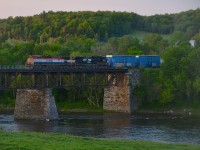Sunset is only half an hour away as CN 393 (finally) departs Richmond yard with BCOL 4610 & NS 9926. Here it is crossing the St-Francois river with 99 cars in tow for Montreal.