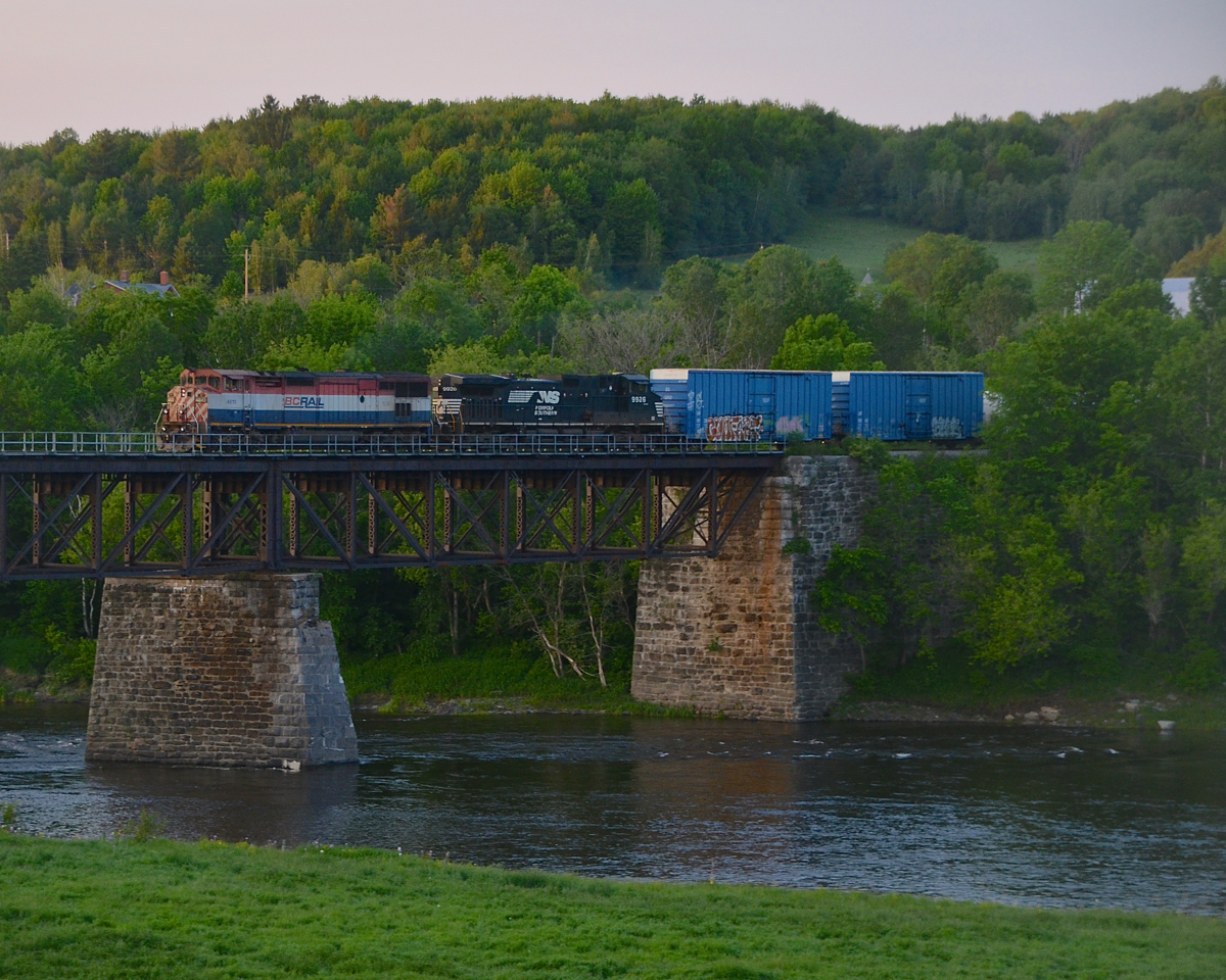 Sunset is only half an hour away as CN 393 (finally) departs Richmond yard with BCOL 4610 & NS 9926. Here it is crossing the St-Francois river with 99 cars in tow for Montreal.