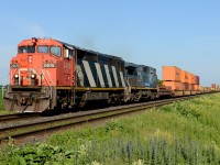 CN 2404 with IC 2457 lead train 148 east bound at Waterworks Road.