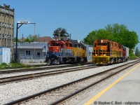 For the GEXR and G&W fans - Train 518 (Stratford road switcher) has ran to Kitchener, and will take this lone car to switch a customer at New Hamburg. Once completed, 518 ran back to Kitchener, grabbing some empty autoracks which just arrived from Toronto on train 431, for a direct connection to the CP interchange at South Junction (A few miles to the south, closer to the border of Cambridge).<br><br>One can see the new Kitchener station name sign on top of the sand tower - the sign was briefly located at the freight shed in 2014 <a href=http://www.railpictures.ca/?attachment_id=15493 target=_blank>(Rob Smith photo here)</a> , only to be removed a month or two later.