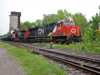 CN 316 passes through Washago on a gray June morning.  30 minutes later, tornado warnings were issued for the area. Luckily they did not materialize, but the downpours did !
If the old coal tower could talk, one can only imagine the great tales it would tell.  Oh to dream ---  