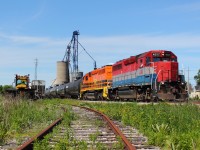 SOR 595 made a rare daylight appearance on Saturday, they are pictured passing through Hagersville on their way back to Nanticoke with RLK 4057 and RLHH 3403 and 20 tank cars.