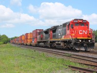 CN 148 cruises through Brantford with CN 2039 on the point, having a standard cab GE leading was a nice change from all of the GEVO's I have been shooting lately on CN.  This made for an excellent lunch hour train.
