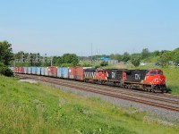 CN 422 slows to enter into Aldershot with a trio of CN units.  While most were shooting 422 at the footbridge at the RBG during the annual CNR Bayview Meet, a few friends and myself went over to the Berm for a better shot.