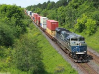 A SD70ACe-P6 demonstrator unit from EMD for CN, the second after class leading 8100, is solo on train Q10531 heading to Calgary Alberta, passing under the Hilda Avenue bridge with solid containers in tow. Class leading 8100 has recently been painted into a CN scheme, and rumor has it 8101 is next. It was cool to catch this unit leading a train still in its blue colors before it gets repainted. This was probably the one and only time I get to see one of these lead a train.