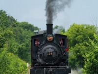 Former Canadian Pacific steam 136, being built in 1914 making it over a century old, is now owned by the South Simcoe Heritage Railway and is seen here charging northbound (going backwards in this photo) towards Beeton, Ontario where it'll head back to Tottenham Station and finish its excursion. This line, was built to connect 4 lakes, Ontario, Simcoe, Georgian Bay, and Huron. Now, all the line is gone except this small portion between Tottenham and Beeton where this heritage railway operates. Due to the heritage railway being non-profit, abilities for advertising are limited and not many tourists know about the railways existence, making it a good opportunity to go and see this steamer in operation.  