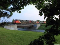 The daily Toronto-Joffre eastbound manifest passes over the New Westminster Drive bridge shot from Gilmore Park. As the sun sets, I took the opportunity to get decent framing rather than just shooting the train straight on which I've done probably hundreds of times at this location.  