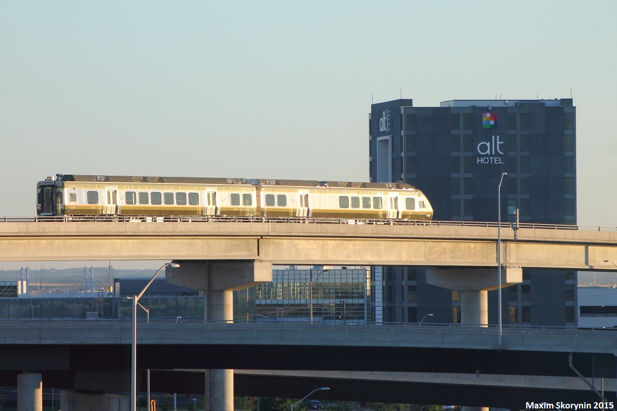 On Saturday, June 6th, 2015 the Union Pearson Express opened its doors to the public with its first run out of Union Station at 05:30. I obviously ventured out nice and early and took the first run to Pearson with a few friends and then took a couple shots of a few of the new UPX trains there, including this one with #3002 leading.