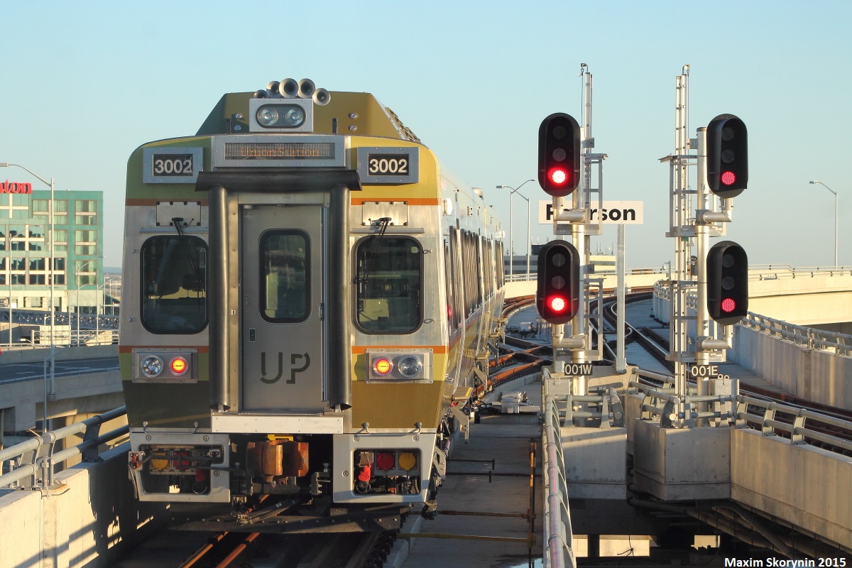 On June 6th, 2015 the Union Pearson Express opened its doors to the public with the first train departing Union Station at 05:30. Here is a eastbound train headed for Union Station departing the Pearson station.