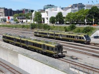 A eastbound Union Pearson Express train passes a stopped one in the Bathurst Yard en route to Union Station, where it'll be arriving in about 1-2 minutes. 