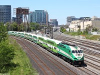 A eastbound GO Transit commuter train charges around the bend from the western portion of Lake Ontario en route to Oshawa GO Station on the east end of Toronto with a MPI MP40PH-3C locomotive in the lead.