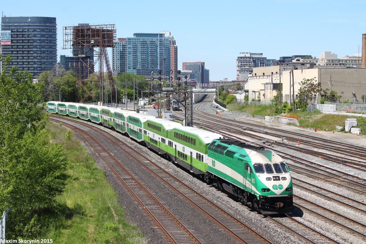 A eastbound GO Transit commuter train charges around the bend from the western portion of Lake Ontario en route to Oshawa GO Station on the east end of Toronto with a MPI MP40PH-3C locomotive in the lead.