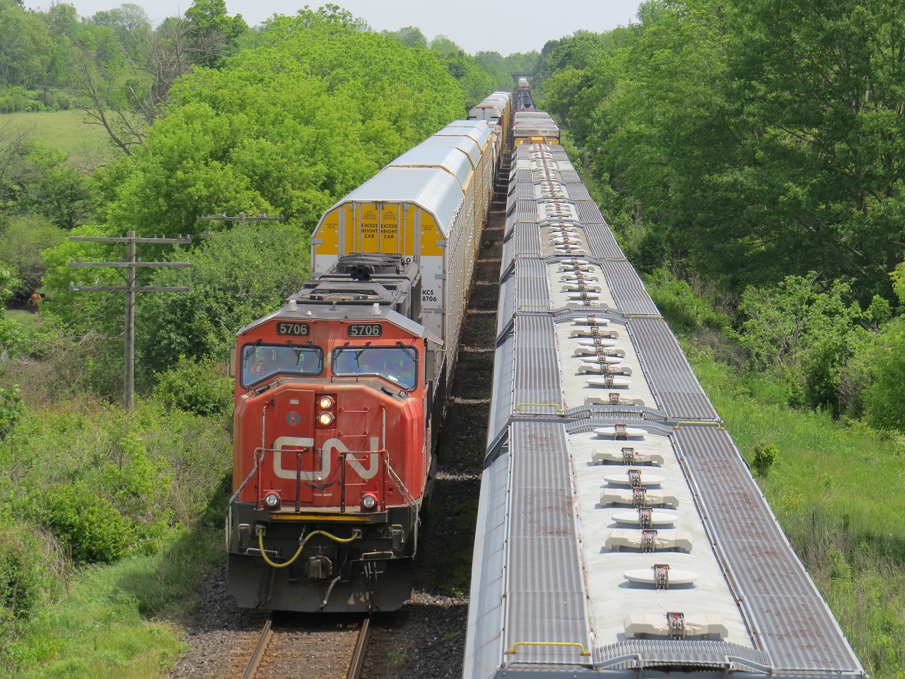 CN A439 west with a clear to limitted is seen passing CN M382 east