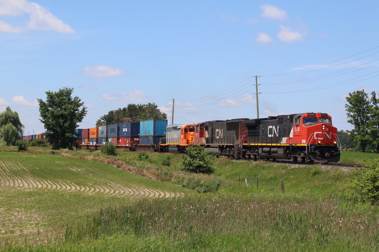 A nice Father's Day surprise today on CN 148 with freshly rebuilt QNS&L SD40-3 #312 making its way east to home rails in Quebec.