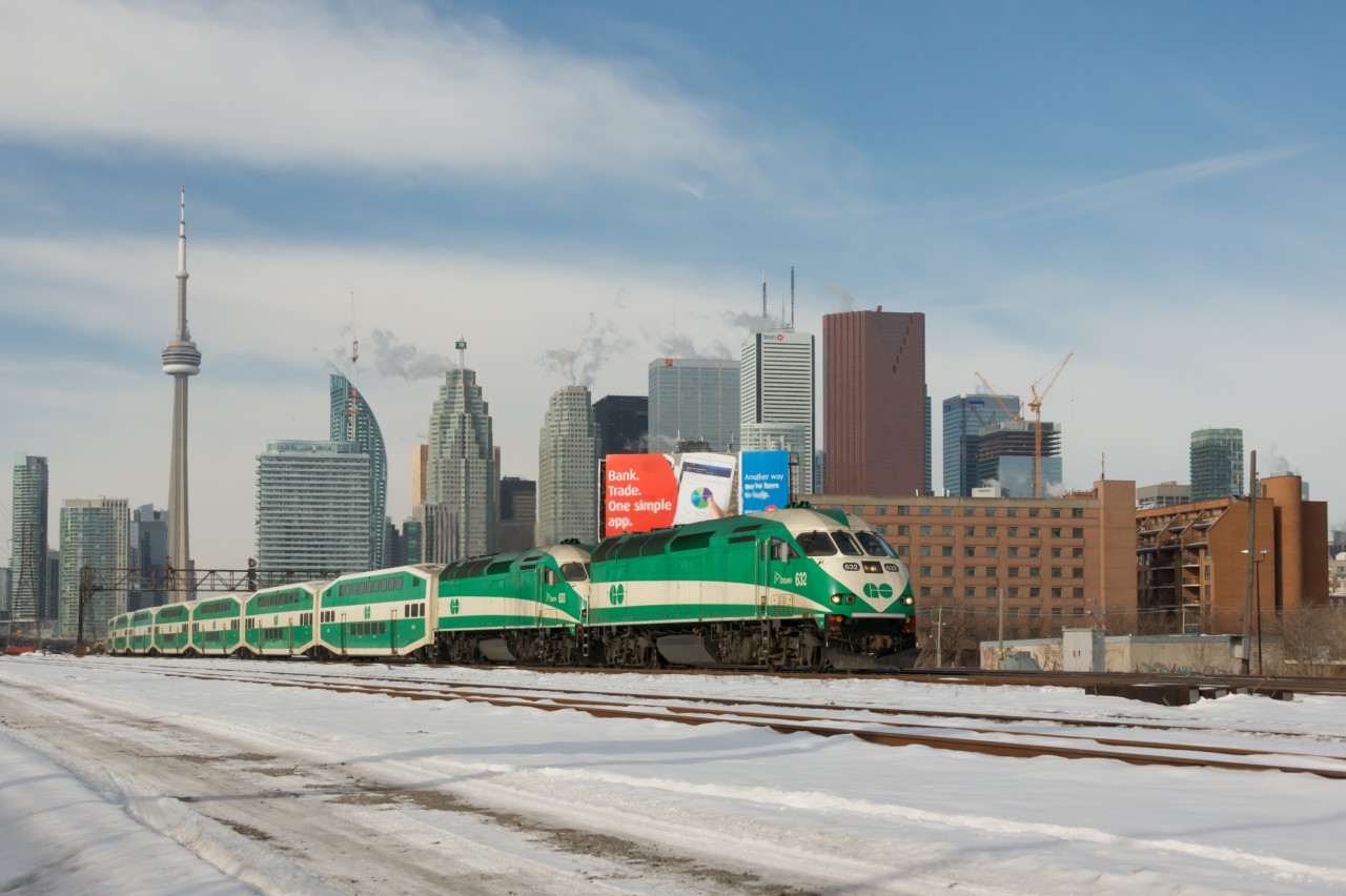 On a frigid March morning when it was far too cold to snow, GO 710 is seen trundling eastward through the USRC on Track E5. Seconds later it will pass the standby train, GO E123, most of whose crew is nestled comfortably in their cab car waiting to be called into action. GO 632 and 633 work their hardest to ascend the grade towards Danforth. This is their second of four climbs of the day; having departed Willowbrook at 0452 that morning, the consist was just five hours into its nearly 20 hour day. It would not return until after midnight.