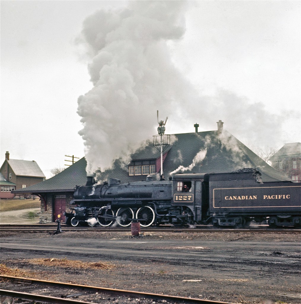On a very gloomy day, the late Del Rosamond found Pacific-type #1227 passing the Pembroke station.  

This is an extremely rare view of this long-gone landmark.