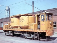 The Toronto Transit Commission's "Sand Car" W-26 is pictured at TTC's Hillcrest Shops complex off Bathurst Street near Davenport. Sand is used by streetcars for extra traction on the rails, and often times an operator would have to top up or add more sand to their car during a shift. The sand car traveled the streetcar system across the city, delivering sand to the various carhouses or barns that the streetcar fleet operated out of. When trucks took over the sand deliveries a few years later, W-26 was retired and scrapped in 1967. 